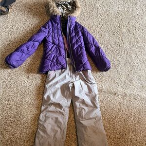 Purple Puffer Jacket with Fur Hood and Gray Snow Pants